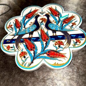 Traditional Iznik Turkish ceramic art, peacock and floral pattern